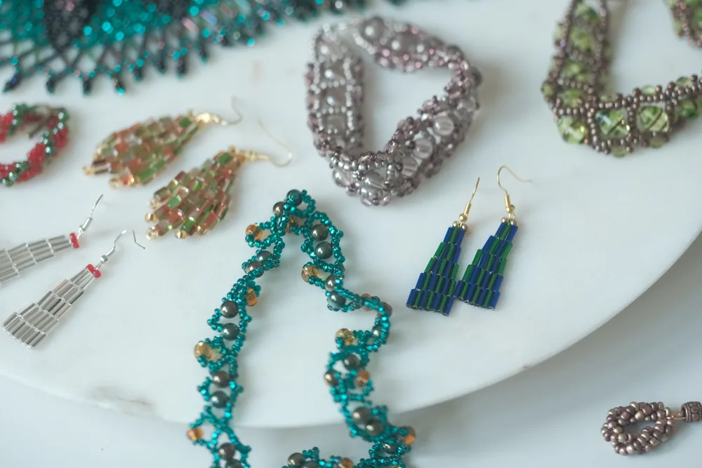 Beaded bracelets arranged on marble