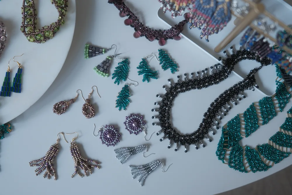 Close detail of fringe and drop earrings