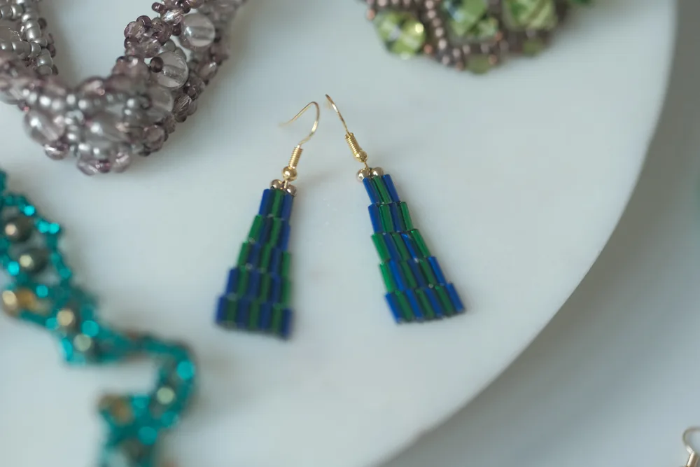 Teal beaded tassel earrings