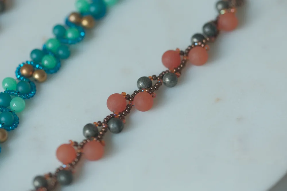 Teal and copper beaded strand necklace